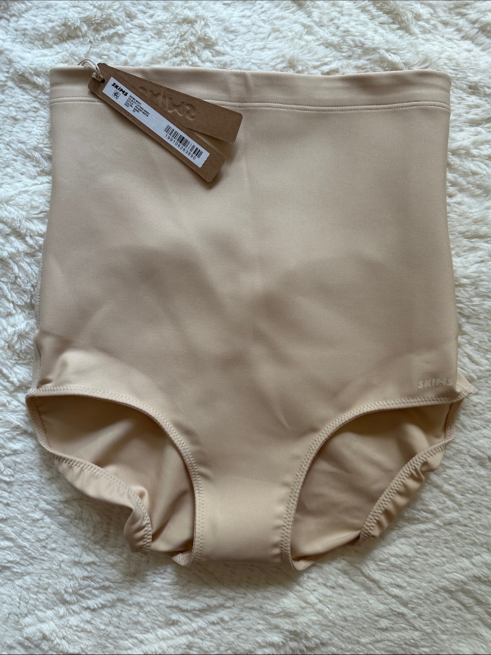 SKIMS Body CS Butt Lifting Briefs in Sand